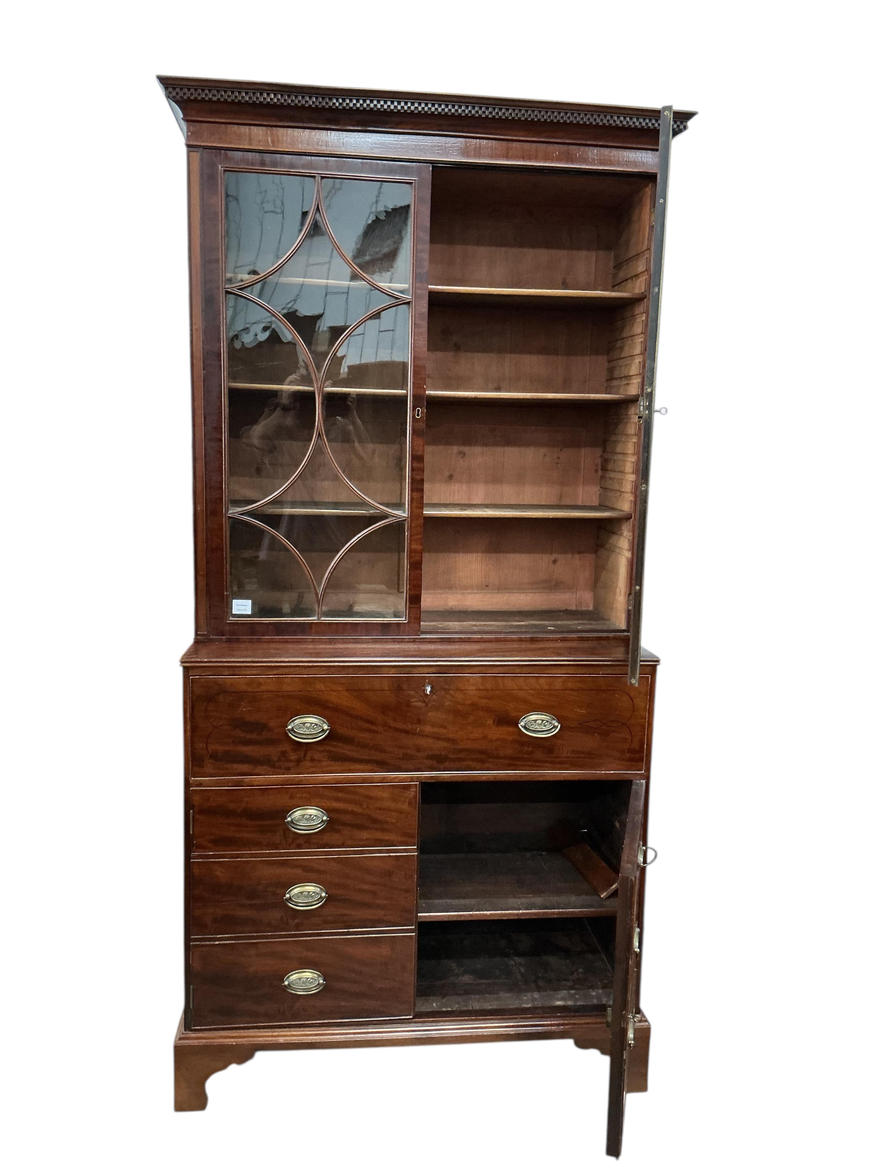 A George III mahogany secretaire bookcase with dummy drawer front, width 116cm, depth 37cm, height 212cm CITES Submission reference 514NUNMK